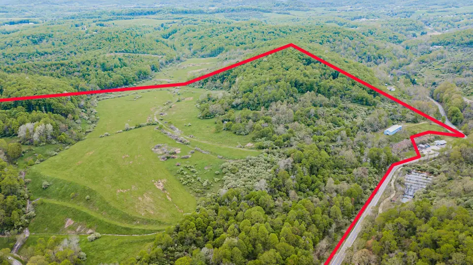 Aerial view of the 117-acre property with approximate property lines