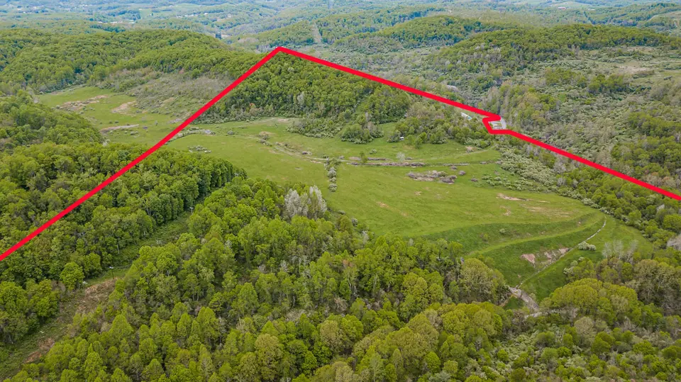 Aerial view toward the north ridge with approximate property lines